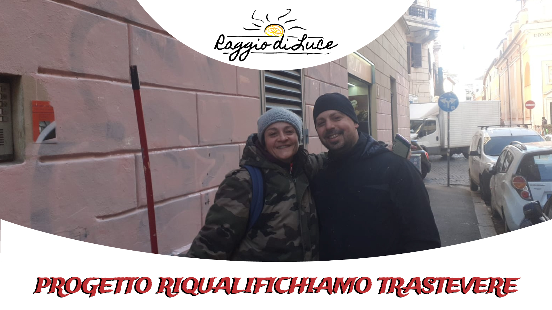 copertina del progetto riqualifichiamo trastevere, con manuele ed emanuele che si abbracciano soddisfatti dopo avere ritinteggiato un muro di trastevere